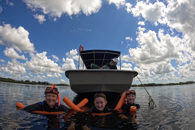 All-Inclusive Small Group Manatee Swim with Free Photos - Wetsuits, cold water, and hot chocolate