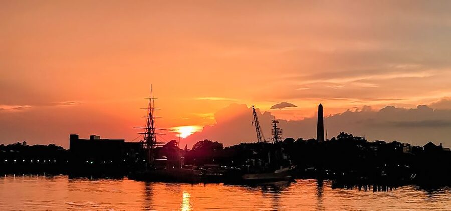 Boston: Boston Harbor Sunset Cruise - Leaving Rowes Wharf and settling aboard