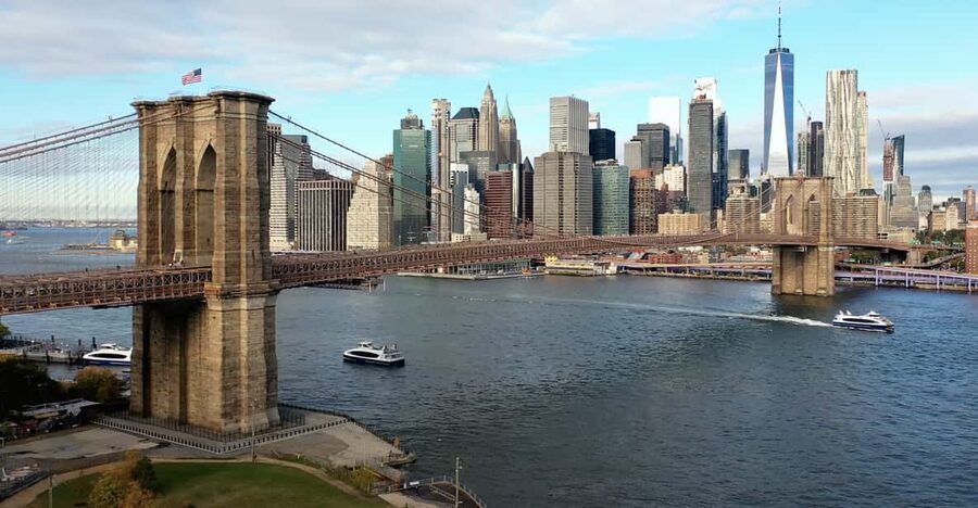 From Manhattan: 5-Hour Bronx, Queens, and Brooklyn Bus Tour - Starting in Midtown and crossing into Harlem
