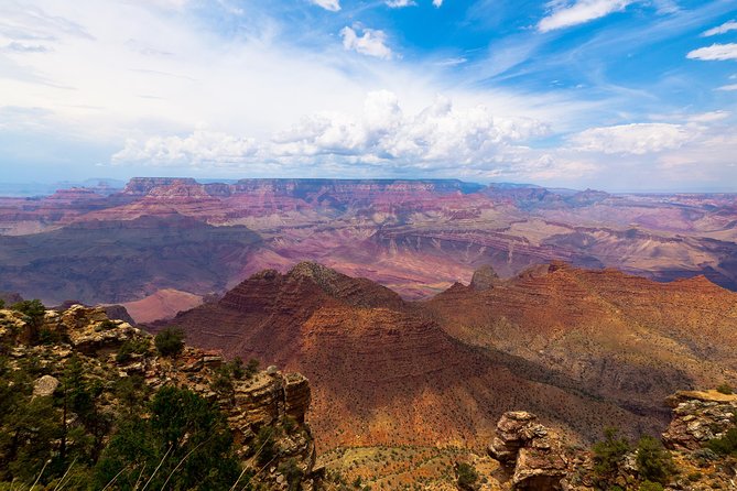 Grand Canyon Landmarks Tour by Airplane with Optional Hummer Tour - Following the Colorado River