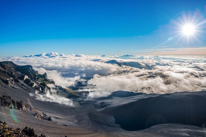 Haleakala Sunrise Tour with Breakfast and West Side Pickup - Watching the sunrise at Haleakalā National Park