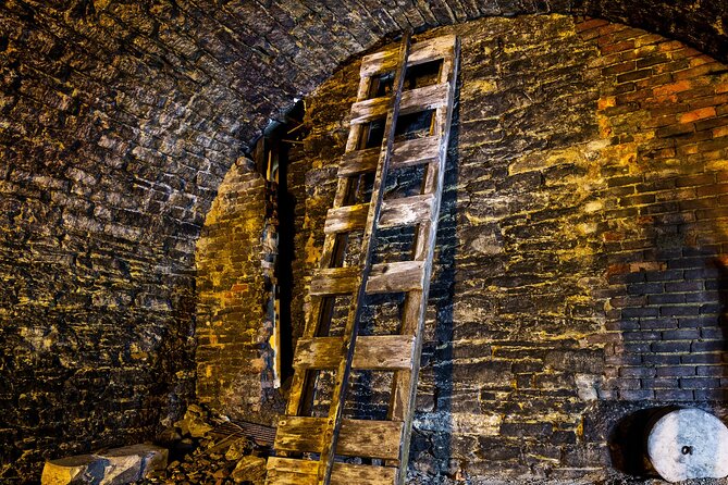 Hidden Brewery Caverns Tour in Cincinnati with Beer Tasting - Entering the Linck Brewery tunnels from 1850