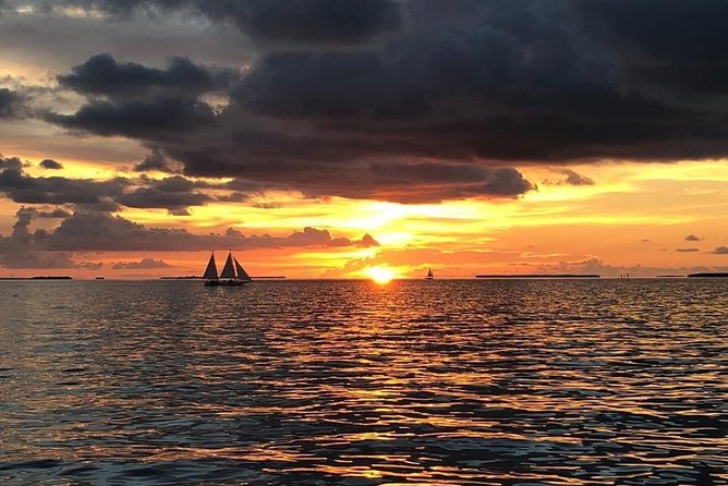 Key West Champagne Sunset Catamaran Cruise - Sunset Celebration with drinks in hand