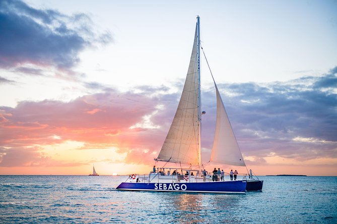 Key West Sunset Sail: Dolphin Watching, Wine, and Tapas - Leaving Key West’s Historic Seaport