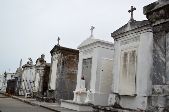 New Orleans Cemetery Bus Tour with Exclusive Cemetery Access - Entering Odd Fellows Rest after dark