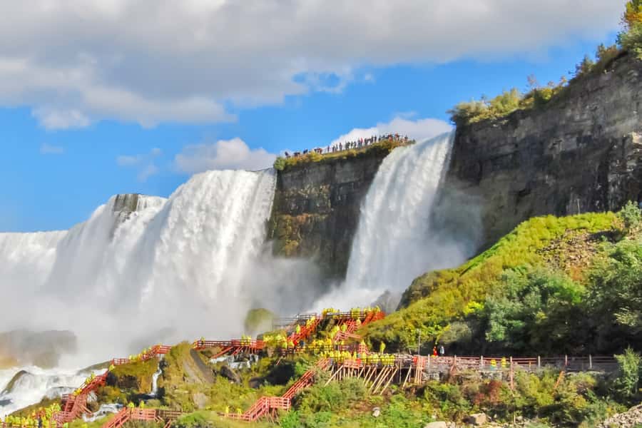 Niagara Falls: Canadian and American Deluxe Day Tour - Getting close at Cave of the Winds