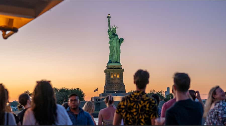 NYC: Statue of Liberty Sunset Cruise Skip-the-Line Ticket - A simple way to see Lower Manhattan from the water