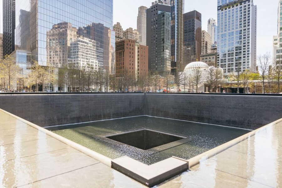 NYC: Wall Street Tour with 9/11 Memorial and Statue Ferry - Federal Hall and Trinity Church: two very different New York stories