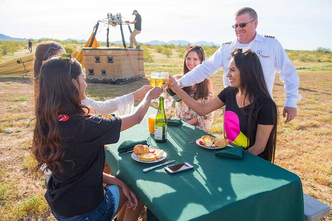 Phoenix Morning Hot Air Balloon Ride with Bubbly + Breakfast - Landing gently, then celebrating on the ground