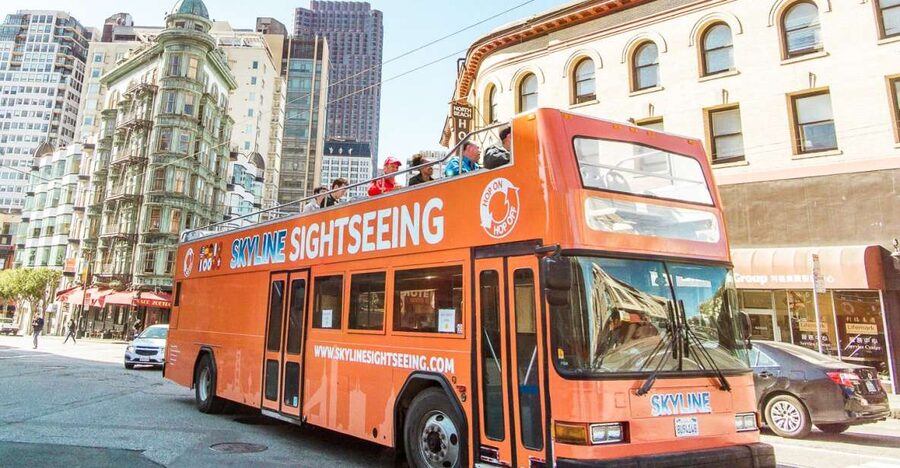 San Francisco: Hop-On Hop-Off Bus with Ferry & Alcatraz Tour - Crossing the Golden Gate Bridge by open-top bus
