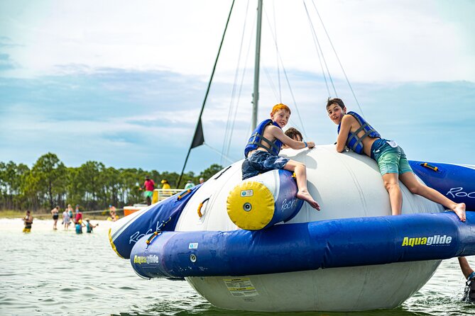 Shell Island Inflatable Adventure Park & Dolphin Sightseeing Tour - From Panama City Beach to Grand Lagoon