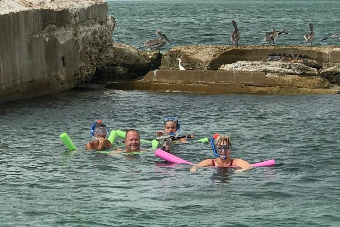 Small Group 2 Hour Dolphin Cruise with Snorkeling to Shell Key - Crossing toward Shell Key Wildlife Preserve