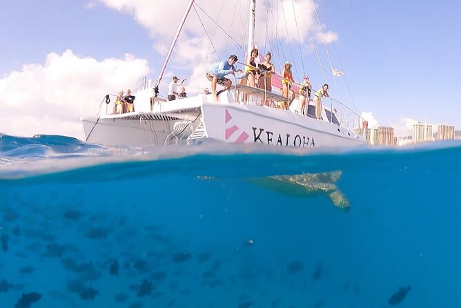 Sunset Boat Cruise: Swim and Cruise Waikiki - Snacks, drinks, music, and the onboard mood