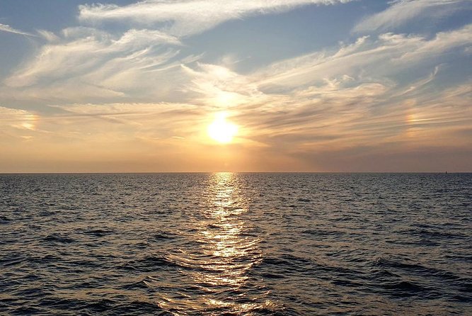 Sunset Celebration Cruise on Tropics Boat Tours - Champagne, music, and the evening mood